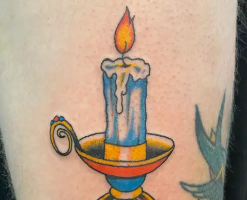 colorful candle tattoo